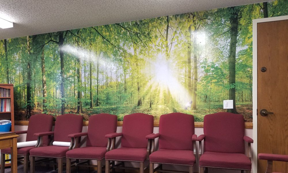 How can wall graphics modify the mood?